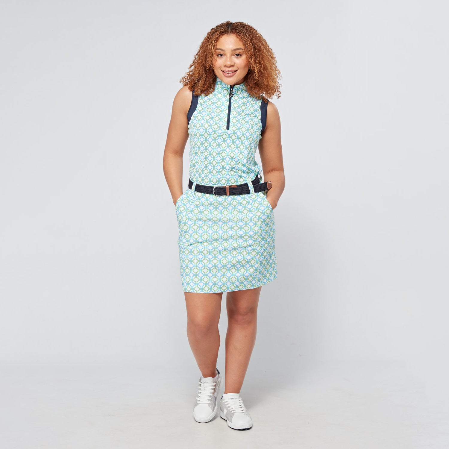 Swing Out Sister Ladies Sleeveless Zip-Neck Polo in Dazzling Blue and Emerald Mosaic Pattern