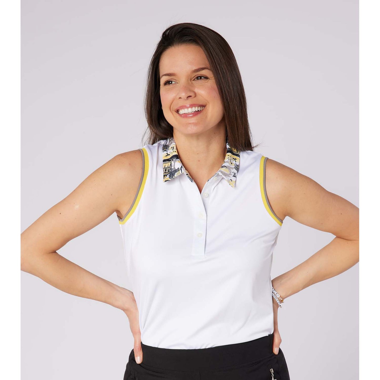 Swing Out Sister Ladies Sleeveless Polo with Subtle Print Accents for Effortless Everyday Style