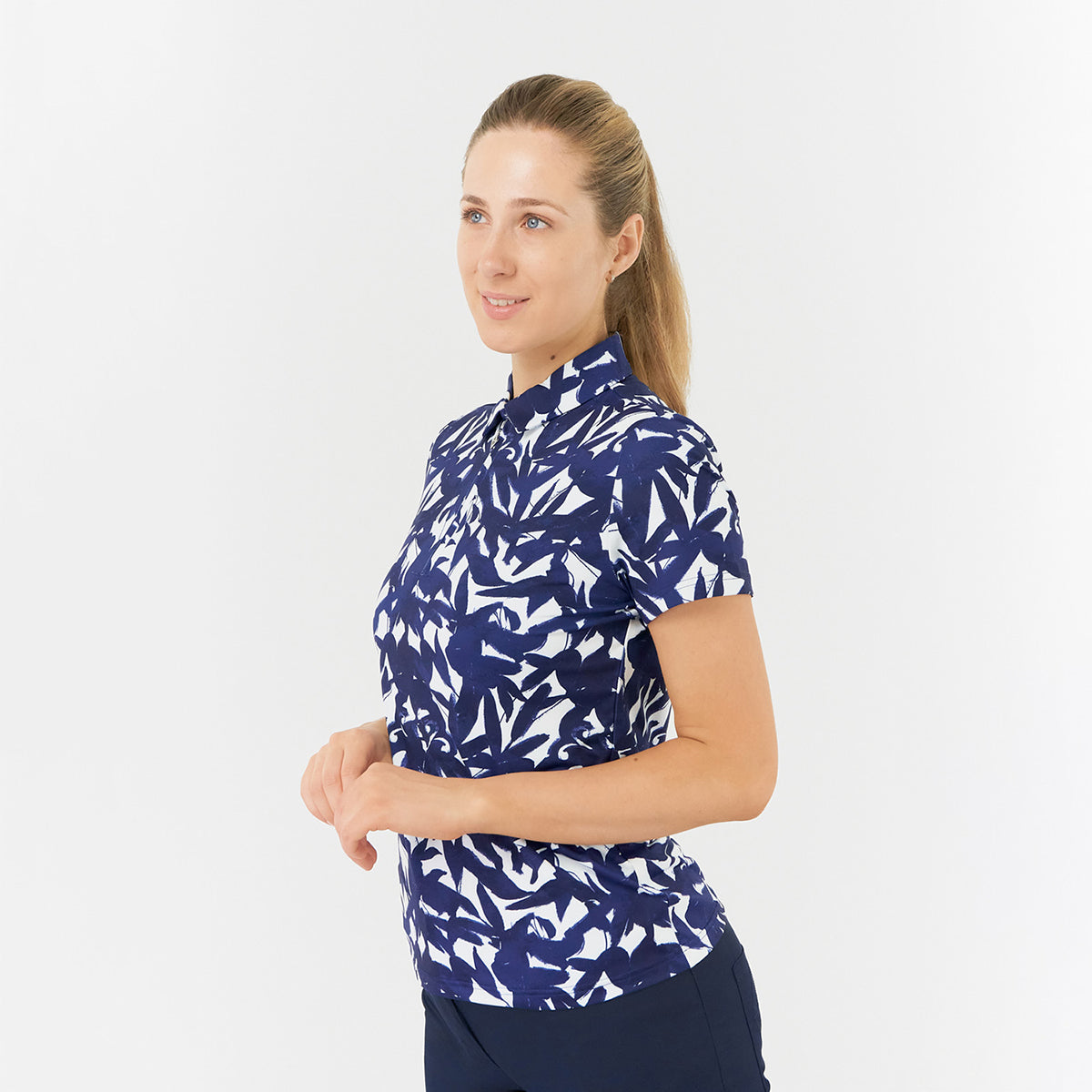 Pure Golf Ladies Short Sleeve Polo in Botanical Navy Print